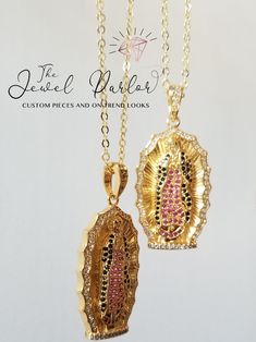 THIS ITEM SHIPS SAME OR NEXT-DAY 📦✈ Oval pendant with a depiction of Our Lady of Guadalupe The figure of the Virgin Mary wears a mantle encrusted with crimson and black crystals and scalloped edge clear crystal frame Pendant measures 40mm (1.6 inches), strung on 18" adjustable link chain Lobster clasp closure 18K gold-plate over alloy metal Clear and colored zircon diamonds Suitable as a gift for First Communion, baptism, or just because Gloria Virgin Mary Necklace + Clear Baguettes also shown Spiritual Medallion Jewelry With Lobster Clasp, Silver Virgin Mary Pendant Jewelry, Spiritual Jewelry: Our Lady Of Guadalupe Round Pendant, Spiritual Virgin Mary Medallion Jewelry, Spiritual Our Lady Of Guadalupe Jewelry Gift, Pink Engraved Pendant Jewelry, Spiritual Our Lady Of Guadalupe Pendant Necklace, Engraved Pink Pendant Jewelry, Virgin Mary Pendant Jewelry As A Gift