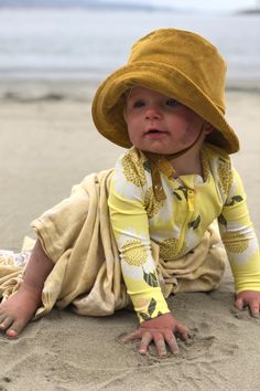 Protect your little one's tender skin and make a stylish statement with our Baby Corduroy Bucket Hat in mustard. This adorable hat provides sun protection while keeping your toddler comfortable and fashionable. Ideal for family beach days, this hat is the perfect companion on all your sunny adventures. Shop now and let your child shine! Yellow Bucket Hat With Upf 50+, Summer Cotton Sun Hat For Playtime, Adjustable Summer Sun Hat For Summer Adventures, Adjustable Sun Hat For Summer Adventures, Bucket Sun Hat With Uv Protection For Summer Activities, Adjustable Summer Bucket Hat For Playtime, Spring Sun Hat With Upf 50+ For Playtime, Uv Protection Bucket Hat For Summer Activities, Upf 50+ Bucket Hat For Summer Activities