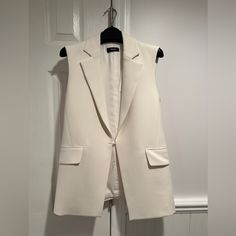 Questions? Leave A Comment Below! White Fitted Sleeveless Blazer, Classic White Workwear Vest, Tailored Sleeveless Spring Outerwear, Classic White Work Vest, Chic White Vest With Pockets, White Sleeveless Formal Outerwear, White Formal Vest For Fall, Formal White Vest For Fall, Elegant White Vest For Fall