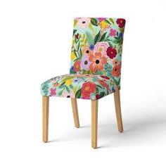 an upholstered chair with colorful flowers on the back and legs, against a white background