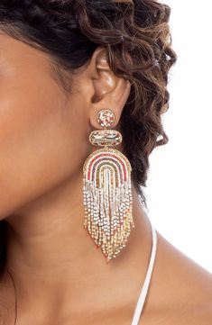 Faceted crystals and colorful beads enliven these fringey drop earrings that move with you. 4 1/2" drop; 1 1/2" width Glass/textile/silvertone plate Imported Bohemian Embellished Beaded Earrings, Multicolor Beaded Chandelier Earrings For Festive Occasions, Festive Multicolor Beaded Chandelier Earrings, Multicolor Beaded Fringe Earrings For Party, Deepa Gurnani, Beaded Drop Earrings, Faceted Crystal, Keep Jewelry, Anniversary Sale