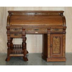 an old wooden desk with two drawers