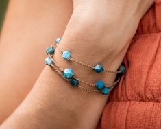 We're obsessed with how versatile & durable our Tula Blue WRAPS are, & we know you will be too! You can wear your WRAP 4 ways: as a necklace, wrapped 3 times as a bracelet, wrapped twice as an anklet, or as a hairpiece. Don't be shy— stack some more! Mix & match your wraps to make unique, eye-catching sets for every outfit. Rock them every way, every day. - Apatite starcut small stones (7-8mm) - Signature hand-spun Tula Blue ROPE - 100% waterproof - Loop & puka shell closure - Standard length: 22" One more thing: Due to the one-of-a-kind nature of our materials, colors & shapes may vary slightly from the images shown. Everyday Hand Wrapped Blue Jewelry, Adjustable Turquoise Faceted Jewelry, Adjustable Faceted Turquoise Jewelry, Outfit Rock, Don't Be Shy, Puka Shell, A Bracelet, Color Shapes, Hand Spinning