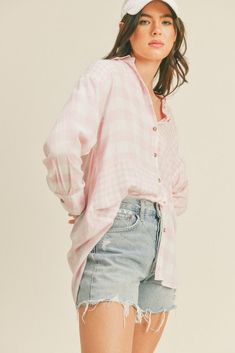 The oversized button-up shirt effortlessly blends comfort and fashion-forward style. With its loose and relaxed fit, it offers a laid-back yet chic vibe that can be easily dressed up or down. Whether paired with leggings for a cozy day in or knotted at the waist over shorts for a trendy look, the oversized button-up shirt is a versatile addition to any casual wardrobe.Size + Fit (inch):S: 23.0 (Bust), 30.5 (Length)M: 23.5 (Bust), 31.0 (Length)L: 24.0 (Bust), 31.5 (Length) Fall Tank Tops, Oversized Button Up Shirt, Cozy Day, Fleece Sweater, Bear T Shirt, Gingham Print, Plaid Jacket, Wardrobe Style, Pink Plaid