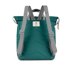 Bantry is Ori's original backpack created with a chunky zip and wide mouth. It can be carried comfortably on your back or by your side with the hand straps. The Bantry features a front pocket closed by a sturdy zip, a secure inside pocket, and a laptop/tablet sleeve inside. The nylon has a shiny look and smooth feel with a gorgeous teal hue. (Color shown may vary depending on individual screen brightness.) 12.6" W x 6" D x 17.5" H Live life in colour with ORI London. All bags & backpacks are mad Versatile Hiking Bag With Adjustable Strap, Standard Backpack With Adjustable Straps For Hiking, Adjustable Straps Backpack For Hiking, Standard Hiking Backpack With Adjustable Straps, Green Outdoor Backpack With Adjustable Strap, Green Hiking Bag With Adjustable Strap, Practical Everyday Backpack With Ykk Zipper, Outdoor Backpack With Adjustable Strap And Softback, Sporty Green Backpack With Adjustable Strap