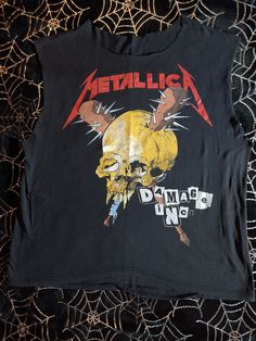 Vintage Metallica Damage Inc shirt. Cool Pushead art on the front and back. I purchased this shirt in the late 80's at a local record shop. It's been in storage for 20+ years. Sleeves and neck have been cut out. The hem on the back has some stitching gone. See pics for exact measurements. Shipped USPS Priority with insurance. Rock Band T Shirts Outfits, Metallica Shirt Outfit, Vintage Metallica Shirt, Pushead Art, Metallica Shirts, Grunge Shirts, Band Clothes, Vintage Rock T Shirts, Vintage Band T Shirts