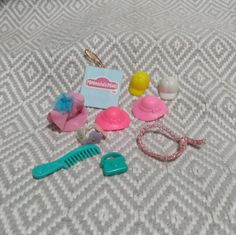 Good condition vintage mini dollhouse sized lot of Melanie's Mall accessories.  Includes: pink floppy hat with blue flower, bright pink sun hat, light pink sun hat, yellow baseball hat, white baseball hat, pink rope belt, floral headband, comb and mini purse. White Baseball Hat, Mini Dollhouse, Rope Belt, Floral Headband, Disco Party, Floral Headbands, Mini Purse, Miniature Toys, Baseball Hat