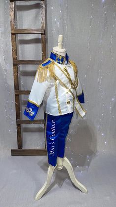 Fitted Gold Sets For Costume Party, Royal Ceremonial Fitted Suit, Ceremonial Royal Fitted Suit, Royal Gold Fitted Sets, Fitted Royal Gold Sets, Royal Long Sleeve Ceremonial Sets, Royal Blue Formal Sets, Royal Ceremonial Fitted Sets, Royal Fitted Ceremonial Sets