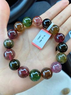 Material:  tourmaline beads  size :  13mm quantity: one strands 6mm approx 29 pcs one strands 7mm approx25 pcs one strands 8mm approx 22 pcs one strands 9mm approx 21pcs one strands 10mm approx 19 pcs one strands 11mm approx 18pcs one strands 12mm approx 16 pcs one strands 13mm approx 16 pcs one strands 14mm approx 15 pcs one strands 15mm approx 14pcs one strands 16mm approx 14 pcs one strands 17mm approx 13pcs one strands 18mm approx 13pcs one strands 19mm approx 12pcs one strands 20mm approx 1 Tourmaline Beaded Bracelets With Natural Stones, Tourmaline Gemstone Beads Bracelet, Spiritual Tourmaline Beaded Bracelets With Round Beads, Spiritual Tourmaline Beaded Bracelet With Round Beads, Tourmaline Gemstone Beaded Bracelets With Round Beads, Rainbow Tourmaline, Tourmaline Bracelet, Tourmaline Beads, Girly Jewelry