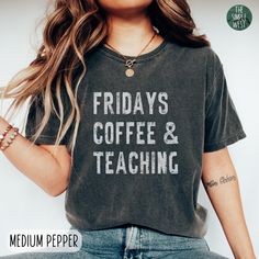 This Teacher Comfort Colors shirt will add a special and personal touch to your wardrobe! This crewneck tee is the perfect gift for teachers that love Fridays, coffee, and teaching. IMPORTANT INFORMATION - All Sales Are Final: refunds, returns, or exchanges are not available since each item is made to order. - Processing Time: 1-4 business days; Shipping Time: 2-5 business days (USPS) - Comfort Colors Brand: fairly thick fabric, high quality shirt. - Unisex Sizing: please check the sizing chart Funny Graphic Print Tops For Everyday, Funny Pre-shrunk Everyday T-shirt, Funny Text Crew Neck Tops For Everyday, Funny Short Sleeve Tops For Everyday, Everyday Crew Neck Top With Funny Text, Funny Text Crew Neck T-shirt For Everyday, Graphic Tee Shirt With Letter Print, Short Sleeve Tops With Funny Text, Funny Cotton Tops For Everyday