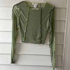 Cute Green Long Sleeve Mesh Top In Small. Never Worn. Feel Free To Ask Any Questions! Trendy Fitted Green Mesh Top, Trendy Green Long Sleeve Mesh Top, Green Fitted Mesh Top With Crew Neck, Fitted Green Mesh Top For Fall, Trendy Green Mesh Top For Spring, Spring Green Mesh Top With Crew Neck, Green Crew Neck Mesh Top For Spring, Green Long Sleeve Mesh Top For Fall, Casual Green Crew Neck Mesh Top