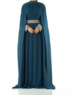 Be royalty at your next event in the Boqorad Crystal Cape Maxi dress! Crafted from lightweight chiffon fabric and fully lined, you'll feel comfortable and elegant as it drapes gracefully over your body. The shoulder cape is adorned with intricate crystal details for a truly regal look. 59inch length chiffon/polyester hand-wash Shoulder Cape, Muslimah Fashion, Pitcairn Islands, Guinea Bissau, Equatorial Guinea, Mozambique, British Indian, Chiffon Fabric, Brunei