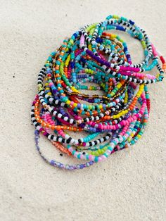 Colorful Beaded Bohemian Stretch Bracelet, Colorful Bohemian Beaded Stretch Bracelet, Bohemian Multicolor Stretch Bracelet For Beach, Bohemian Rainbow Letter Beads Friendship Bracelet, Multicolor Tiny Beads Bracelet For Summer, Bohemian Multicolor Beaded Bracelets With Letter Beads, Summer Multicolor Tiny Beads Bracelets, Summer Multicolor Bracelets With Tiny Beads, Summer Multicolor Tiny Beads Bracelet