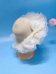 Cute Bendable Beige Straw Hat with Ivory Organza Fabric Overlay and Big Bow for the Spring and Summer seasons. Perfect for Weddings, flower girls, Easter Sundays, Beach, Parties etc. Size: 52 cm Crown- Best fits ages 2 years to 7 years. Make: 100% Paper Shipping & Processing Times For the US: It usually takes 7-10 days to process the order and 5-10 business days for the shipment to arrive. For Canada: 7-10 business to process the order and 7-15 business days for the shipment to arrive. The rest Topi Vintage, Summer Straw Hat, Toddler Girl Summer, Beige Boho, Beach Parties, Childrens Hats, Wide Brim Sun Hat, Christening Dress, Trendy Kids