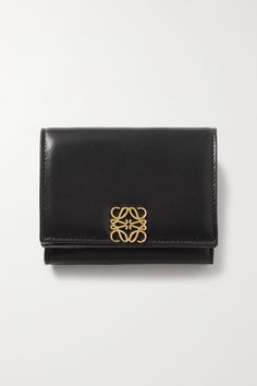 Loewe's wallet is embellished with the brand's 'Anagram' logo, which was first designed by Spanish artist Vicente Vela in 1970. It's been crafted in the house's native Spain from glossed-leather and opens to reveal compartments for your cards, bills and receipts. Loewe Wallet, Spanish Artists, Your Cards, One Design, Women Collection, Leather Wallet, Luxury Design, Porter, Branding Design