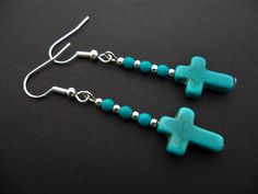 This a pair of pretty little  tibetan silver dangly cross earrings. Measure approx. 5cm from top of hook to bottom of earring. Freshly made by me and unworn. Thanks for looking!! Nickel Free Adjustable Cross Earrings, Adjustable Turquoise Cross Jewelry, Handmade Turquoise Cross Jewelry, Turquoise Cross, Beaded Cross, Cross Earrings, Dangly Earrings, Turquoise Beads, Silver Turquoise