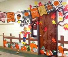 a classroom door decorated with fall decorations