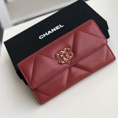 Length: 7.5 in Height: 4.25 in Width: 1 in COMES WITH Dust bag We this is an CHANEL Lambskin Quilted Chanel 19 Flap Wallet Black or This stylish wallet is crafted of luxurious quilted lambskin in Red with an aged gold leather threaded Chanel CC logo.A Luxury Red Leather Wallet, Luxury Quilted Clutch For Formal Events, Luxury Quilted Clutch For Formal Occasions, Elegant Quilted Rectangular Wallet, Elegant Quilted Wallet For Formal Occasions, Elegant Quilted Wallets For Formal Occasions, Quilted Rectangular Wallets For Evening, Quilted Rectangular Evening Wallets, Classic Formal Quilted Wallet