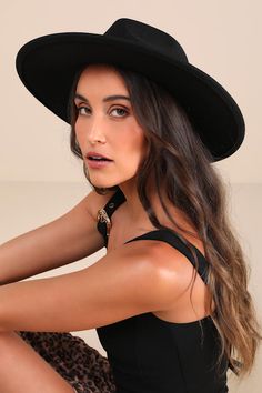 From boho 'fits to brunch babe looks, we are obsessed with the Four Buttons So Composed Black Felt Fedora Hat! Soft and sturdy felt shapes this simple-yet-chic hat that has a wide brim and a high collar, finishing with a classic, fedora-style dipped crown. 4. 75" Soft Brim. 21" Interior Circumference (Relaxed). Crown Measures 4. 5" Tall. 100% Polyester. Spot Clean. Imported. Lulus | So Composed Black Felt Fedora Hat | 100% Polyester. Chic Hat, Fedora Style, 75 Soft, Felt Shapes, Boho Fits, Cold Weather Hats, Felt Fedora, Black Felt, Hat Band