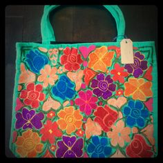 a colorful bag with flowers on it