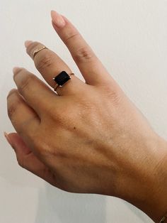 A simple & understated statement piece. This ring is so easy to wear while really adding a subtle punch to your jewelry stack. Currently Available // 14kt yellow gold, size 8 Product Description // Featuring a 9x7mm emerald cut Onyx on a 1.2mm band Available in 14kt yellow gold, white gold, & rose gold with a two week production time if not in the "Ready To Ship" tab and matching currently available above. Email makeityours@laneandkate.com for requests w custom sizing & gemstones available. 14k Gold Rings With Vs Clarity For Everyday, Everyday 14k Gold Rings With Vs Clarity, Modern 14k Gold Filled Stackable Rings, Modern Stackable 14k Gold Filled Rings, 14k Gold Signet Ring With Vs Clarity For Everyday, 14k Gold Signet Ring For Everyday, Modern Everyday Solitaire Stackable Rings, Minimalist 14k Gold Ring With Vs Clarity, Adjustable 14k Gold Signet Ring For Everyday