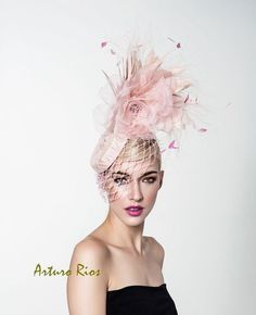 Beautiful Blush pink headpiece from my new Spring collection, made on a flat pillbox base with beads and sequins, adorned with a big silk rose , goose, rooster and peacock feathers and blush hexagonal netting. it includes an elastic string to secure it around your head. All hats are hand made in the US to order, please allow 2 weeks while we make and ship it. If this is a rush order please contact me first. All sales are final, if you have any question, please feel free to contact me. Thank you Elegant Pink Hair Accessories For Royal Ascot, Pink Headband Fascinator For Races, Pink Headband Fascinator For Evening, Pink Evening Fascinator Headband, Pink Pinched Crown Headpiece For Races, Elegant Pink Headband For Kentucky Derby, Elegant Pink Fascinator For Event, Pink Headpieces For Royal Ascot Event, Elegant Pink Fascinator For Events