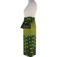 This Ankara Peplum Pencil Skirt features a daring peplum design that adds a pop of style to any wardrobe. Crafted from Ankara fabric, this skirt provides a comfortable fit and a unique look. With its form-fitting shape and vibrant colors, you'll be sure to make a statement with this skirt. Product Features Please Compare your Measurements To our Size Chart Before Purchase Fully Lined Fitted waist Center back seam with invisible zipper Regular fit- true to size Skirt Length is 30 Inches from Wais Peplum Designs, Poncho Blouse, Ankara Print, African Ankara, Ankara Fabric, Bedding Accessories, Bottom Clothes, Mud Cloth, Waxed Cotton