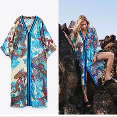 Brand New With Tags. Oversized Fit. Turquoise V-neck Maxi Dress For Vacation, Blue V-neck Beach Cover-up, Chic Blue V-neck Cover-up, Blue V-neck Festival Cover-up, Turquoise Maxi Dress For Beach Cover-up In Spring, Blue V-neck Cover-up For Summer, Blue Flowy Cover-up For Beach Season, Blue V-neck Maxi Dress For Day Out, Light Blue V-neck Maxi Dress For Beach