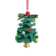 a crocheted christmas tree ornament hanging from a red ribbon