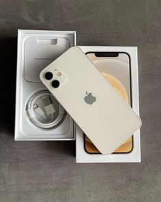 an apple iphone 11 in its box with the case open and it's inside