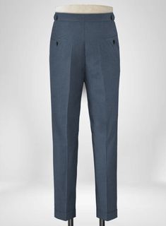 A sober but sumptuous couture will not only create a fashion statement but can also prove to be ordinarily best. Made from wool, microfibre and lycra, our Napolean Stretch Space Blue Wool Trousers is a piece that feels soft and light on your body and also can pull off your stunning personality. So it's high time you upgrade your wardrobe with our unique Trousers that can pull off a look and always leave an impression on others. 
 
Look Includes   Napolean Stretch Space Blue Wool Fabric  Cross Po Elegant Tailored Blue Pants, Elegant Blue Wool Bottoms, Luxury Fitted Full-length Dress Pants, Tailored Blue Elegant Bottoms, Tailored Elegant Blue Bottoms, Elegant Tailored Blue Bottoms, Elegant Blue Wool Pants, Elegant Blue Bottoms For Formal Occasions, Elegant Blue Bottoms For Semi-formal Occasions