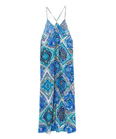 This breezy, 100% silk slip dress is the perfect statement-maker for a beachside wedding or sunny day getaway. Add the Essential Cocoon for elegant shoulder coverage.​ Sizing: XS - L Size Guide: (Body Measurements)Materials: 100% SilkMade in: China Elegant Beach Slip Dress With Tie Back, Elegant Tie Back Slip Dress For Beach, Summer Printed Slip Dress With Spaghetti Straps, Chic Printed Slip Dress For Summer, Silk Maxi Dress With Spaghetti Straps For Beach, Printed Sleeveless Slip Dress For Summer, Flowy Spaghetti Strap Slip Dress For Vacation, Multicolor Summer Slip Dress With Spaghetti Straps, Beach Silk Printed Dresses