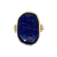 We love this cocktail Lapis ring set in 14k yellow gold. It is accented with gold beads and sits beautifully on Emily's signature Sterling Silver band. Approximate stone size is 20mm x 14mm. Approx ct weight: 10.6 ct Mohs hardness: 5-6 This mixed metal piece is handmade to order in Emily's Hudson Valley studio. Please allow for slight variations in stone color, size and shape. Please allow 14-21 days to ship unless the piece is in stock. If you have questions about sizing, shipping or custom ord Yellow Gold Stackable Oval Jewelry, Oval Stackable Yellow Gold Jewelry, Oval Yellow Gold Stackable Jewelry, Sterling Silver Gold Rings With Gemstone, Classic 14k Gold Jewelry With Gemstone Accents, Gold Sterling Silver Rings With Gemstone, Yellow Gold 14k Rings With Natural Stones, Luxury 14k Gold Jewelry With Large Stone, 14k Yellow Gold Jewelry With Large Stone