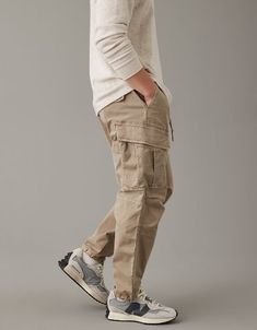 AE Relaxed Cargo Pant Casual Cargo Pants With Multiple Pockets, Casual Cargo Pants With Pockets For Outdoor, Casual Cargo Pants For Outdoor, Relaxed Fit Cargo Jeans With Elastic Waistband For Outdoor, Utility Sweatpants With Cargo Pockets For Outdoor, Casual Baggy Cargo Jeans With Elastic Waistband, Beige Bottoms With Pockets For Outdoor Activities, Casual Tapered Leg Cargo Pants, Cotton Cargo Pants With Elastic Waistband For Outdoor