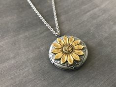 Hey, I found this really awesome Etsy listing at https://www.etsy.com/listing/740256251/gold-sunflower-locket-vintage-style Locket Vintage, Sideways Initial Necklace, Gold Locket Necklace, Star Necklace Gold, Photo Locket Necklace, Sunflower Necklace, Nature Necklace, Wedding Gifts For Bridesmaids, Gold Locket