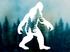 the silhouette of a bigfoot standing in front of trees