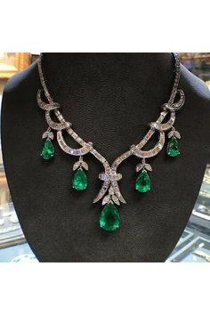 Luxury Pear-shaped Diamond Emerald Necklace, Luxury Pear-shaped Emerald Necklace With Diamonds, Formal White Gold Emerald Necklace With Jewels, Luxury Diamond Necklace With Jewels For Anniversary, Pear-shaped Emerald Necklace For Formal Events, Elegant Green Pear-shaped Diamond Necklace, Elegant Formal Pear-shaped Emerald Necklace, Elegant Pear-shaped Emerald Necklace For Formal Occasions, Luxury Pear-shaped Emerald Gemstone Necklace