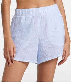 Cloud-like softness, effortless styling and a wonderfully crinkled texture in 100% cotton. These flattering striped cover-up shorts are the ideal layer for cool, carefree coverage by the water or a casual trip into town. High-Rise (Classic Fit): Sits at waist. Inseam 4". 100% cotton in a lightweight 4 oz. crinkled gauze. Machine wash and dry. Comfortable pull-on elastic waist. Two hand pockets. Imported. | Women's Cloud Gauze Cover-Up Shorts, Stripe, Cotton Wishlist Summer, Striped Swimwear, Active Swimwear, Rash Guard Swimwear, Rash Guard Women, Active Outfits, Swim Shirts, Women's Cover Up, Summer Fits