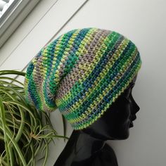 Crochet hat with noble matt lustre effects through merino wool and dazzling silk. 70% Merino wool, 20% Viscose, 10% Silk. Lana Grossa yarn (Italy) Light green, yellow green, gray, petrol beanie. Ready to ship. This hat best fits an average adult/teen head size. If you need this hat in a different size or in any other color please just let me know! All my hats are produced in a smoke-free and pets-free home. Care instruction:  Hand wash and lay flat to dry. Thank you for visiting JuliaHats! Have Bonnet En Crochet, Knit Slouchy Hats, Womens Slouchy Beanie, Knitted Wool Beanie, African Hats, Women Beanie, Handmade Hats, Bonnet Crochet, Cotton Beanie