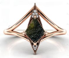 Mix personality and power with this Raw Moldavite Ring, with a twig/branch style band and a boho look that is perfect for you! Please note that this ring is available in two stone sizes, and since they are all natural raw stones, the shape and orientation of each stone varies from ring to ring. They are all genuine works of nature, and therefore no two stones are the same. The pictures in the listing are to give you a general idea of what these stones look like as well as the twig style band of the ring. * Metal: 925 Sterling Silver * Finish: Polished * Stone Name: Moldavite * Stone Size: Rough * Number Of Pieces: 1 * Stone Cut: Rough * Stone Weight Big: 3.18 Carats * Stone Weight Small: 2.25 Carats Details: We resize our rings before we ship, so please choose your size in the dropdown men Agate Wedding Ring, Kite Ring, Moldavite Ring, Bijoux Art Nouveau, Moss Agate Engagement Ring, Agate Engagement Ring, Meteorite Ring, Moss Agate Ring, Ring Art Deco