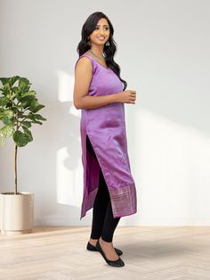 Elevate your festive wardrobe with our EthnoChic Lavender Silk Kurta. Made from premium Mangalagiri silk, this kurta is designed for those special moments. Embrace the timeless elegance of silk and feel effortlessly graceful. Whether it's a celebratory occasion or a group gathering, this kurta ensures you exude charm and sophistication. Add a touch of luxury to your ensemble with this Lavender Silk Kurta from EthnoChic. Key Specifications : Material Mangalagiri Silk Occasion Festive Type Kurta Eid Traditional Wear With Unstitched Blouse, Semi-stitched Purple Raw Silk Kurta, Purple Semi-stitched Raw Silk Kurta, Purple Art Silk Kurta With Zari Work, Straight Kurta For Navratri Rituals, Navratri Rituals Straight Kurta, Purple Raw Silk Kurta For Eid, Bollywood Style Purple Raw Silk Kurta, Purple Bollywood Style Raw Silk Kurta