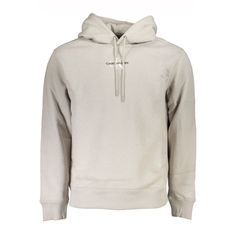 Elevate Your Casual Wardrobe With This Cozy, Eco-Conscious Calvin Klein Hooded Sweatshirt. Crafted With A Blend Of Soft Cotton And Durable Polyester, Featuring 20% Recycled Cotton, This Gray Sweatshirt Boasts A Comfortable Fleece Feel Perfect For Your Everyday Ensemble. The Sleek Embroidery And Bold Logo Add A Touch Of Luxury To An Everyday Staple, Ensuring You Stay Stylish While Making An Environmentally Friendly Choice. Material: 62% Cotton, 38% Polyester Country Of Origin: Tr Color: Gray We A Heather Grey Cotton Hoodie Sweats, Spring Heather Grey Sweatshirt With Drawstring Hood, Calvin Klein Hooded Sweatshirt For Winter, Calvin Klein Hooded Winter Sweatshirt, Calvin Klein Hooded Sweatshirt For Fall, Calvin Klein Hooded Hoodie For Fall, Calvin Klein Hoodie Sweatshirt For Fall, Calvin Klein Hoodie Sweatshirt For Winter, Calvin Klein Cotton Hoodie For Fall