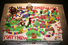 a birthday cake decorated with candy and candies