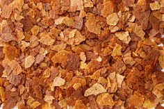 a pile of cereal sitting on top of a white table