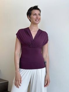 caraucci plant-based rayon stretch jersey purple cross over neckline top #color_jam Versatile Stretch Wrap Top, Fitted Solid Color Wrap Top, Fitted Versatile Top For Yoga, Versatile Fitted Top For Yoga, Versatile Fitted Yoga Top, Chic Fitted Yoga Tops, Casual Fitted Wrap Tops, Chic Yoga Tops, Fitted Wrap Tops For Workwear