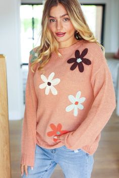 Get instant flair with this flower patch oversized knit sweater with long sleeves and a round neck. This is the perfect lightweight sweater for seasonal transitions. Pair with your favorite jeans and booties for a casual and cute fall outfit. Flower Patch Round Neckline Stretchy 100% Acrylic Lightweight True to Size :: Approximate Measurements :: Bust (side to side seam): S 23" M 24" L 25" 1X 27" 2X 28" 3X 29" Length (shoulder to hem): S 28" M 29" L 30" 1X 32" 2X 33" 3X 33" Model Measurements: 5