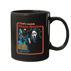 a black coffee mug with an image of a ghost on the front and words, let's watch scary movies