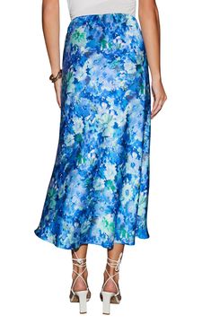 A vintage-look floral print brightens a supple satin midi skirt that's perfect for a garden party. Hidden side-zip closure 100% polyester Hand wash, dry flat Imported Satin Flared Skirt For Spring, Silk Flowy Skirt With Floral Print, Silk Floral Print Flowy Skirt, Silk Floral Print Midi Skirt, Silk Floral Print Skirt, Spring Blue Satin Bottoms, Blue Skirt For Spring Garden Party, Spring Satin Relaxed Fit Skirt, Spring Silk Midi Skirt