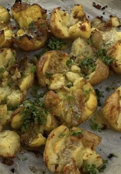 cooked potatoes with herbs and seasoning on top