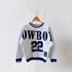 90s Dallas Cowboys NFL sweatshirt/ Kids * PLEASE READ BEFORE PURCHASE * PLEASE consider the PHOTOS before making the decision * The images may DIFFER in appearance from the actual product because we took pictures under daylight.  * PLEASE send your PHONE NUMBER after your purchase for the shipping company to contact you X No returns X No refund Condition : 9/10 More details : look at the pictures  Brand : Legends  Size :  Pit to pit/ Chests : 20/40 inches  Length : 23.5 inches  Material : cotton polyester  Color : gray * ALL ITEMS are VINTAGE which may show some signs of wear and tear * Due to the different display and different light, the picture may not reflect the actual color of the item * Please, remember that our items are vintage so they may show some signs of wear, tear and yellow Personalised Fans, Baby Jumpers, Nfl Sweatshirt, Vintage Dallas Cowboys, Bulldog Sweatshirt, Cowboys Svg, Cowboys Logo, Hockey Sweatshirts, Cowboys Nfl